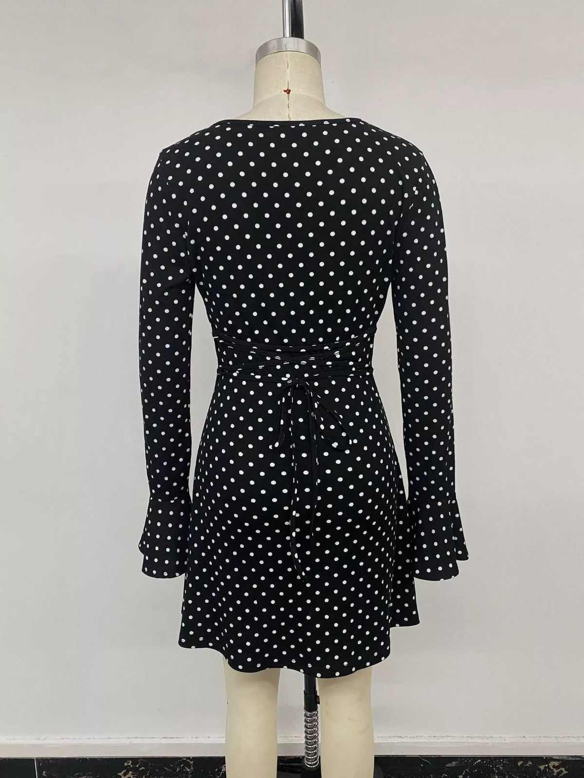 polka dot long sleeve ruffle hem mini dress | dropsona - neutral - front view