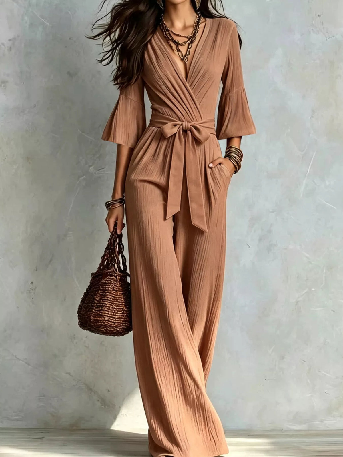 pleated wide-leg jumpsuit with tie-waist | dropsona - neutral - close-up detail