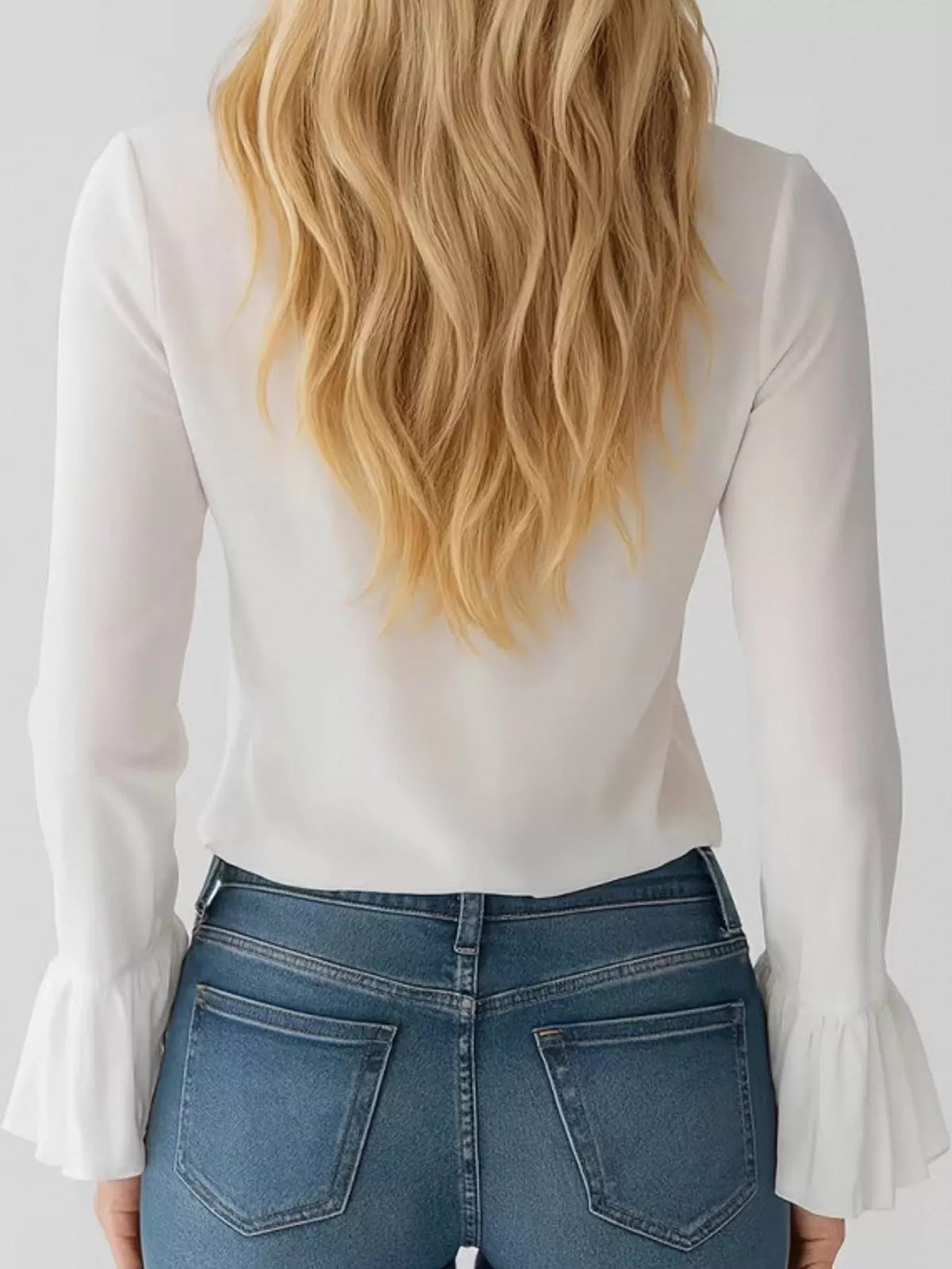 ruffled v-neck blouse with bell sleeves | dropsona - neutral - close-up detail